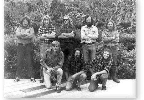 GOUGH 25 (1979-1980): Back (L-R) A. Bean (Medic), R.J. Thorpe (Senior Meteorologist), T. Stock (Radio Technician), I.J. Saunders (Meteorologist/Leader), F.Nel (Diesel Mechanic); Front: B.K. Appel (Meteorologist), E. Van Heerden (Radio Operator), G. Bristow (Meteorologist).