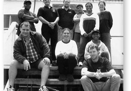 GOUGH 46 (2000-2001): Back (L-R) Pumeza Skepe, Chris Swanepoel, Deryck Yelverton, Piet, Princess, Erica Sommers; Front: Louis Janse van Vuuren, Brigitte, Linda, Richard.