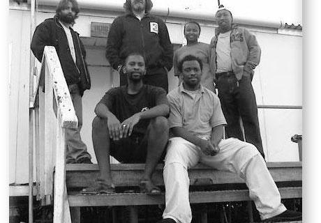 GOUGH 48 (2002-2003): Back (L-R) Gideon Nel (Medic), Chris Swanepoel (Diesel Mechanic/Leader), Daphney Zitha (Meteorologist), Peter Lekalakala (Senior Meteorologist/Deputy Leader); Front: Abner Matlala (Meteorologist), Thulani Ntshanga (Radio Technician).