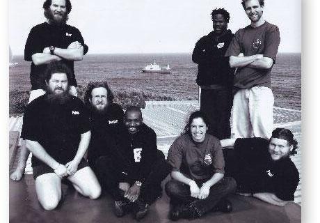 GOUGH 49 (2003-2004): Back (L-R) Martin Slabber (Radio Technician), Shadrack Podile (Senior Meteorologist/Leader), Ross Wanless (Biologist); Front: Petrus Kritzinger (Medic/Deputy Leader), Norman Leveridge (Meteorologist), Steven Phakula (Meteorologist), Andrea Angel (Biologist), Paul Putter (Diesel Mechanic).