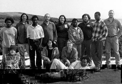 MARION 56 (1999-2000): Back (L-R) Alvan Gabriel (Conservation Officer, Entomologist), Bianca Harck (Sealer), Azwianewi Makhado (Sealer), Stephen Holness (Deputy Leader, Geomorphologist), Elizma Kitshoff (Senior Meteorologist), Peter Mailula (Meteorologist), Jan van der Westhuizen (Diesel Mechanic), Gcobani Popose (Birder), Deryck Yelverton (Radio Technician); Middle: Wernel Nel (Geomorphologist), Claire Potgieter (Birder), Tersia Venter (Leader, Medic); Front: Thabo Bela (Meteorologist).