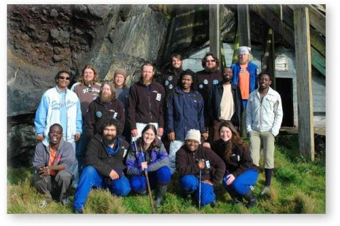 MARION 64 (2007-2008): Front (L-R) Fulufhelo Mukhadi (Phenology), Charl van Aardt (Deputy Leader/Diesel Mechanic), Michelle Roffe (MCM Birder), Asanda Phiri (Phenology), Jacqueline Davis (Geomorph); Middle: Gidwille Makaleni (Senior Meteorologist), Jacques Burgers (Leader/Radio Technician), Johann Jamneck (Meteorologist), Innocent Mthembu (MCM Birder), Steven Phakula (Meteorologist), Mashudu Phalanndwa (Sealer); Back: Henk Louw (PFIAO Birder), Paul Visser (PFIAO Birder), Barend Van Der Merwe (Geomorph), Neil Brown (Medic), Chris Oosthuizen (Sealer).