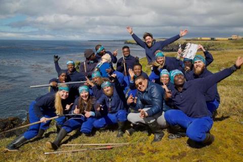 MARION 77 (2020-2021): Back (L-R) Aphiwe Dyum (Communication Technician), Yinhla Shihlomole (Field Assistant - Sealer), Khuliso Maphaha (Assistant Meteorologist), Philani Ngcobo (Assistant Meteorologist), Tom Hartwell (Plimsoll Cameraman); Middle (L-R) Thando Cebekhulu (Birder), Pethokuhle Hlongwane (Base Engineer), Mpho Mashau (Environmental Control Officer), Katie Wardle (Plimsoll camera woman), Ruth Peacey (Plimsoll director), Stephanus Schoeman (SANSA Engineer) Front (L-R): Danielle Keys (Field Assistant -Birder and Science Team Leader), Leandri de Kock (Field Assistant - Winder), Frikkie van der Vyver (Field Assistant -Sealer), Alain Jacobs (Diesel Mechanic), Winnie Moodaley (Medical Orderly and Team Leader), Nkoane Mathabatha (Senior Meteorologist and Deputy Team Leader).