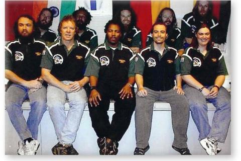 SANAE 40 (2001): Back (L-R) Robert Inglis (Mechanical Engineer), Adrian Adonis (Diesel Mechanic), Anton Grobler (Electronic Engineer), Stephan de Wet (Electrical Engineer), Dirk Uys (HF Radar Engineer); Front: Farouk Parker (Medical Doctor/Leader), Aiden Flack (Diesel Mechanic), Ntembeko 'Zinho' Njovane (Anoks Scientist), Carl Bellingan (Amigo Scientist), Charne Reyneke (Meteorologist/Deputy Leader).