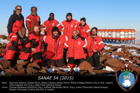 SANAE 54 (2015): Back (L-R) Raymond Williams (Diesel Mechanic), Naaim Coetzee (Diesel Mechanic), Phillip Chibage (Electrical Engineer & Deputy Leader), Henk Potgieter (VLF Engineer), Abby Paton (Medical Doctor). Front: Thomas Matabane (Electronic Engineer), Graham Bainbridge (Mechanical Engineer), Johan O'Kennedy (Meteorologist), Morgan O'Kennedy (Cosmic Ray Engineer & Team Leader).